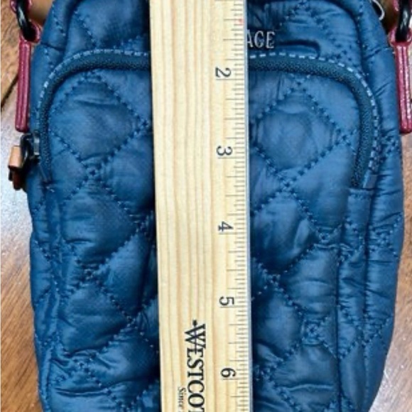 Mz Wallace Blue Quilted Crossbody Bag
26” adjustable strap - Picture 4 of 5